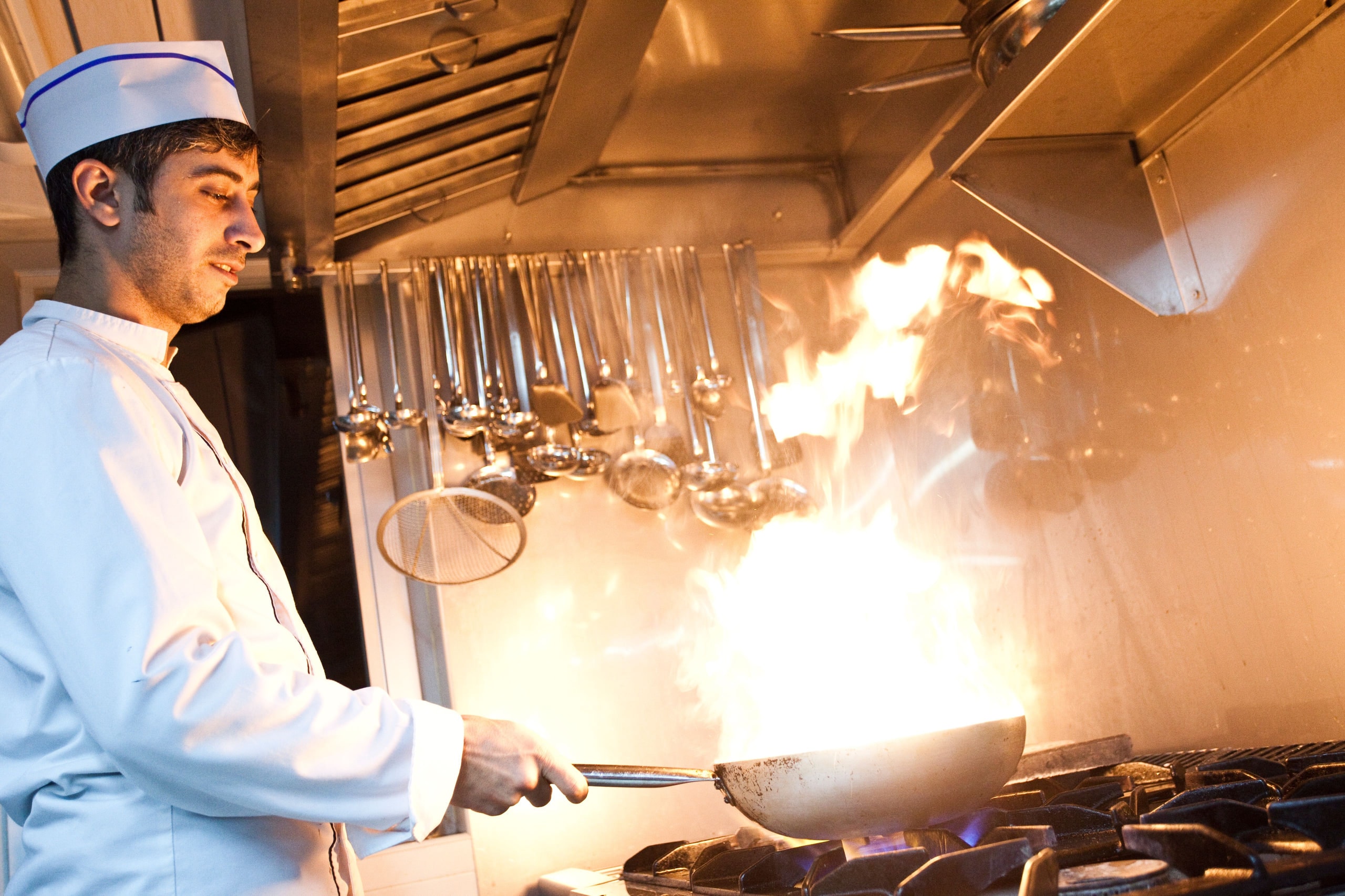 Chef cooking in a professional kitchen